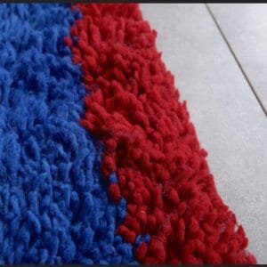 Zouhour – Solid Blue Berber Rug with Red Border
