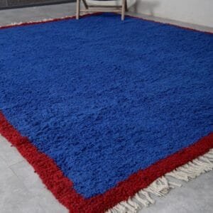 Zouhour – Solid Blue Berber Rug with Red Border