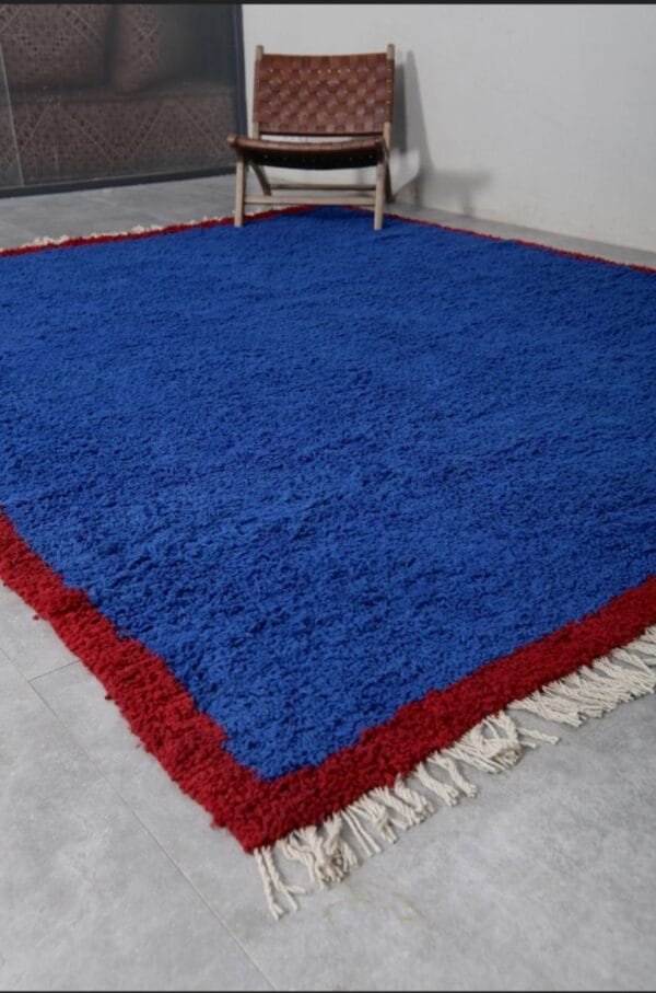 Zouhour – Solid Blue Berber Rug with Red Border