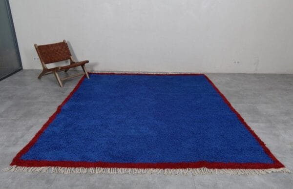 Zouhour – Solid Blue Berber Rug with Red Border